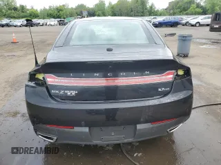 2013 Lincoln MKZ with VIN 3LN6L2JK1DR807478, listed as a Copart auction lot 56911525 with 105,827 mi miles and Salvage title. Bid and sale history available at DreamBid. Image 6.