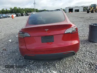 2024 Tesla Model Y with VIN 7SAYGDED2RA331985, listed as a Copart auction lot 60240705 with Not provided miles and Salvage title. Bid and sale history available at DreamBid. Image 6.