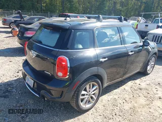 2013 MINI Countryman S ALL4 with VIN WMWZC5C51DWP30972, listed as a IAAI auction lot 40574307 with 153,570 mi miles and . Bid and sale history available at DreamBid. Image 4.