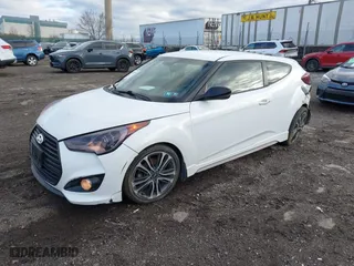 2016 Hyundai Veloster Turbo with VIN KMHTC6AE1GU264876, listed as a IAAI auction lot 41706399 with 136,954 mi miles. Bid and sale history available at carsss.com. Image 17.