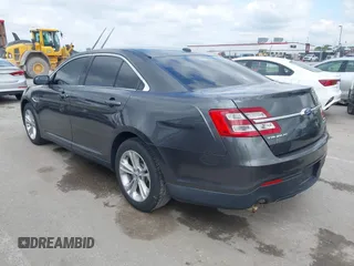 2015 Ford Taurus SEL with VIN 1FAHP2E83FG175051, listed as a IAAI auction lot 42357517 with 200,033 mi miles and . Bid and sale history available at DreamBid. Image 3.