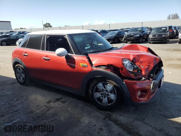 2017 MINI Hardtop 4 Door Cooper with VIN WMWXU1C56H2E17834, listed as a Copart auction lot 51663735 with 53,228 mi miles and Salvage Title. Bid and sale history available at carsss.com. Image 4.