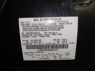 2014 Lincoln MKS with VIN 1LNHL9EK3EG601471, listed as a IAAI auction lot 41142126 with 110,432 mi miles. Bid and sale history available at carsss.com. Image 9.