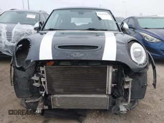 2014 MINI Hardtop S z VIN WMWXM7C59ET970371, wystawiony jako IAAI lot #41643992 z przebiegiem 123 813 mil mil oraz . Historia ofert i sprzedaży dostępna na DreamBid. Obrazek 12.
