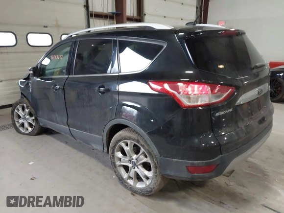 2015 Ford Escape Titanium z VIN 1FMCU0JX9FUB48089, wystawiony jako IAAI lot #41048127 z przebiegiem 133 439 mil mil oraz . Historia ofert i sprzedaży dostępna na DreamBid. Obrazek 3.