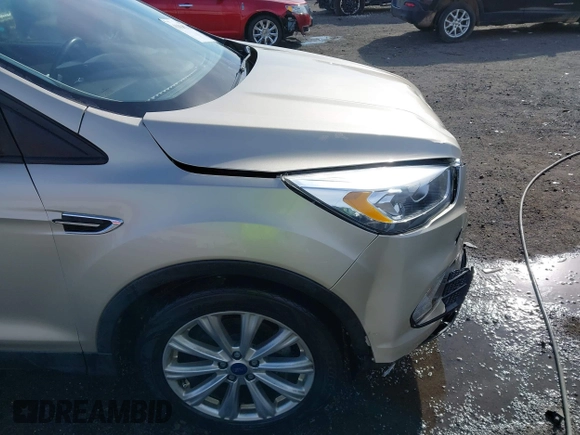 2017 Ford Escape Titanium with VIN 1FMCU0JD3HUB19602, listed as a IAAI auction lot 41816296 with 70,311 mi miles. Bid and sale history available at carsss.com. Image 18.