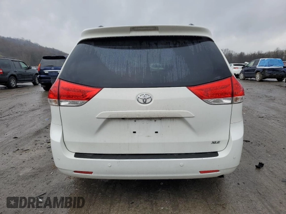 2011 Toyota Sienna XLE AAS with VIN 5TDYK3DC3BS046747, listed as a Copart auction lot 52611945 with 241,040 mi miles and Salvage Title. Bid and sale history available at carsss.com. Image 6.