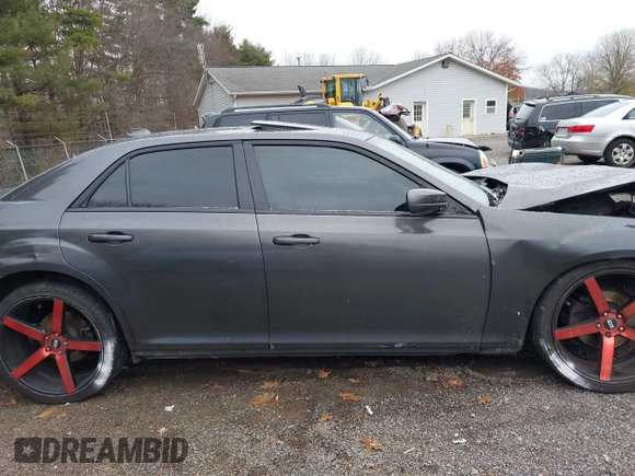 2016 Chrysler 300 S with VIN 2C3CCABG9GH230229, listed as a IAAI auction lot 40937329 with 147,808 mi miles and . Bid and sale history available at DreamBid. Image 14.