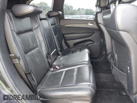 2014 Jeep Grand Cherokee Limited z VIN 1C4RJFBG0EC365866, wystawiony jako IAAI lot #42542796 z przebiegiem 165 511 mil mil oraz . Historia ofert i sprzedaży dostępna na DreamBid. Obrazek 8.