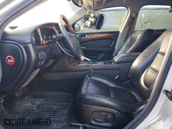 2004 Jaguar XJ with VIN SAJWA71C84SG32106, listed as a Copart auction lot 81837704 with 119,268 mi miles and Salvage Title. Bid and sale history available at carsss.com. Image 7.