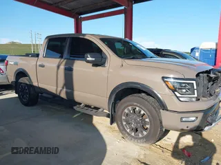 2021 Nissan Titan SV with VIN 1N6AA1ED1MN523973, listed as a IAAI auction lot 42406382 with 73,688 mi miles and . Bid and sale history available at DreamBid. Image 13.