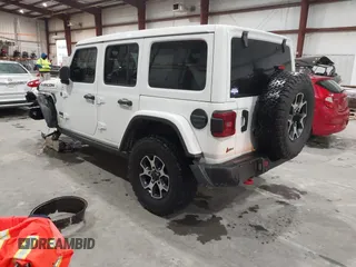 2021 Jeep Wrangler Unlimited Rubicon with VIN 1C4HJXFN2MW809904, listed as a IAAI auction lot 41567956 with 34,000 mi miles and . Bid and sale history available at DreamBid. Image 3.