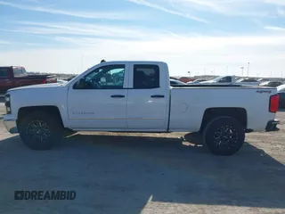 2014 Chevrolet Silverado 1500 LT with VIN 1GCVKREH4EZ343111, listed as a IAAI auction lot 41339803 with 185,314 mi miles and . Bid and sale history available at DreamBid. Image 14.