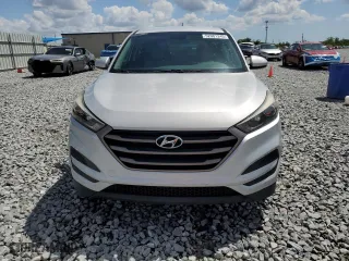 2016 Hyundai Tucson SE with VIN KM8J23A47GU129370, listed as a Copart auction lot 52081245 with 39,652 mi miles and Salvage Title. Bid and sale history available at carsss.com. Image 5.