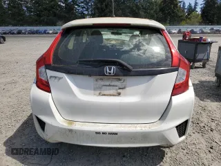 2016 Honda Fit LX z VIN JHMGK5H5XGX027499, wystawiony jako Copart lot #55629475 z przebiegiem Nie podano mil oraz Szkody całkowita. Historia ofert i sprzedaży dostępna na DreamBid. Obrazek 6.