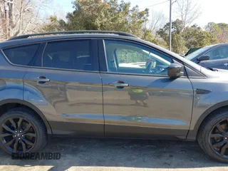 2017 Ford Escape SE with VIN 1FMCU9GD9HUC84906, listed as a IAAI auction lot 41762989 with 147,721 mi miles. Bid and sale history available at carsss.com. Image 13.