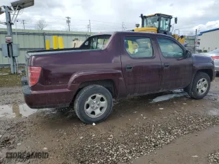 2010 Honda Ridgeline RT with VIN 5FPYK1F23AB008602, listed as a Copart auction lot 52180695 with 144,878 mi miles and Salvage Title. Bid and sale history available at carsss.com. Image 3.