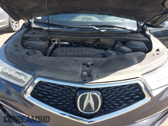 2019 Acura MDX Technology with VIN 5J8YD4H5XKL029023, listed as a IAAI auction lot 42108214 with 73,535 mi miles and . Bid and sale history available at DreamBid. Image 10.
