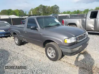 1999 Mazda B-Series Truck SX z VIN 4F4YR12C6XTM38074, wystawiony jako IAAI lot #42034377 z przebiegiem 149 107 mil mil oraz . Historia ofert i sprzedaży dostępna na DreamBid. Obrazek 1.