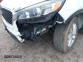 2016 Kia Sorento LX with VIN 5XYPG4A36GG035639, listed as a IAAI auction lot 42140364 with 142,711 mi miles. Bid and sale history available at carsss.com. Image 6.