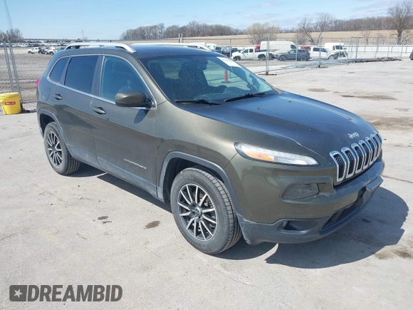 2015 Jeep Cherokee North with VIN 1C4PJMCS9FW588826, listed as a IAAI auction lot 41952883 with 145,586 mi miles. Bid and sale history available at carsss.com. Image 1.