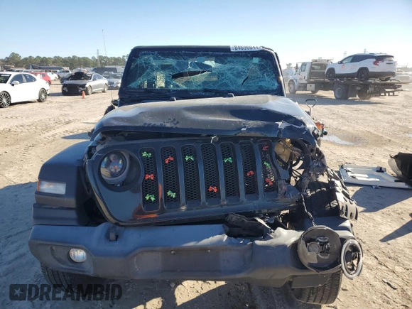 2021 Jeep Wrangler Sport S with VIN 1C4GJXAN1MW665247, listed as a Copart auction lot 84696044 with 71,693 mi miles and Salvage Title. Bid and sale history available at DreamBid. Image 5.