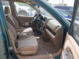 2004 Honda CR-V LX with VIN JHLRD68454C018815, listed as a IAAI auction lot 42077724 with 162,107 mi miles and . Bid and sale history available at carsss.com. Image 5.