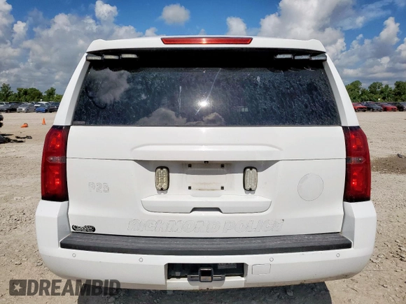 2015 Chevrolet Tahoe Commercial with VIN 1GNLC2EC4FR590119, listed as a Copart auction lot 62159795 with 93,021 mi miles and Salvage title. Bid and sale history available at DreamBid. Image 6.
