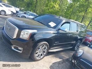2015 GMC Yukon XL Denali with VIN 1GKS1JKJ5FR653076, listed as a IAAI auction lot 42072132 with 288,568 mi miles. Bid and sale history available at carsss.com. Image 14.