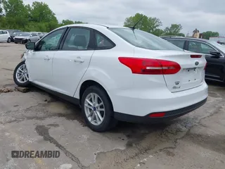 2018 Ford Focus SE with VIN 1FADP3F29JL223389, listed as a IAAI auction lot 42127707 with 87,145 mi miles and . Bid and sale history available at DreamBid. Image 3.