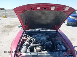 1999 Ford Mustang with VIN 1FAFP4445XF193138, listed as a IAAI auction lot 41716629 with 124,477 mi miles and . Bid and sale history available at DreamBid. Image 10.