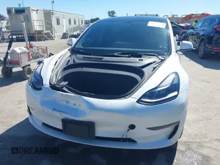 2023 Tesla Model 3 z VIN 5YJ3E1EA3PF451392, wystawiony jako IAAI lot #41668299 z przebiegiem 77 915 mil mil oraz . Historia ofert i sprzedaży dostępna na DreamBid. Obrazek 11.