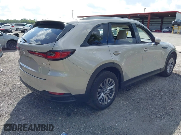 2024 Mazda CX-90 3.3 Turbo Preferred with VIN JM3KKBHD9R1186934, listed as a IAAI auction lot 41806531 with 9,751 mi miles. Bid and sale history available at carsss.com. Image 4.