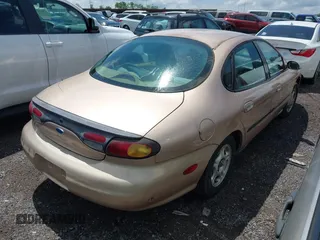 1997 Ford Taurus GL z VIN 1FALP52U9VA280563, wystawiony jako IAAI lot #42045413 z przebiegiem 219 484 mil mil oraz . Historia ofert i sprzedaży dostępna na DreamBid. Obrazek 4.
