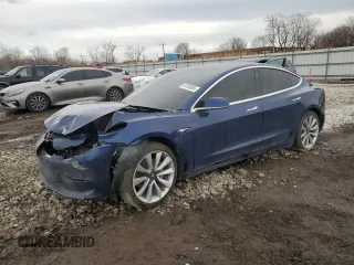 2018 Tesla Model 3 Long Range Battery z VIN 5YJ3E1EBXJF092039, wystawiony jako Copart lot #44793895 z przebiegiem 56 231 mil mil oraz Szkoda całkowita • Salvage title. Historia ofert i sprzedaży dostępna na DreamBid. Obrazek 1.