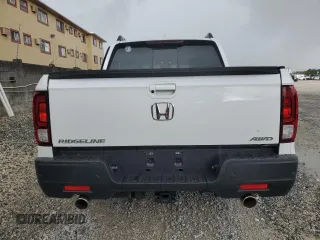 2023 Honda Ridgeline RTL-E with VIN 5FPYK3F76PB064582, listed as a Copart auction lot 63629375 with 11,940 mi miles and Salvage title. Bid and sale history available at DreamBid. Image 6.