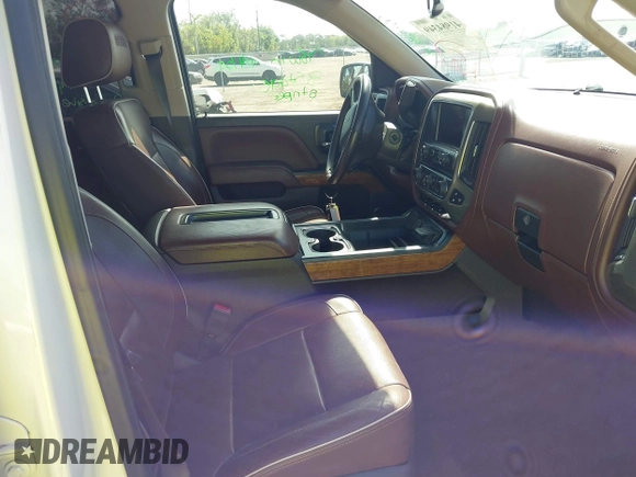 2014 Chevrolet Silverado 1500 High Country with VIN 3GCUKTEC4EG401571, listed as a IAAI auction lot 41984349 with 104,221 mi miles and . Bid and sale history available at DreamBid. Image 5.