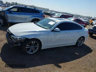 2019 BMW 4 Series 430i with VIN WBA4J1C54KBM18190, listed as a IAAI auction lot 42012759 with 73,598 mi miles. Bid and sale history available at carsss.com. Image 15.