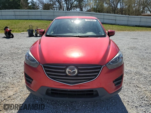 2016 Mazda CX-5 Grand Touring z VIN JM3KE2DYXG0840777, wystawiony jako Copart lot #49700585 z przebiegiem 116 469 mil mil oraz Szkoda całkowita • Salvage title. Historia ofert i sprzedaży dostępna na DreamBid. Obrazek 5.