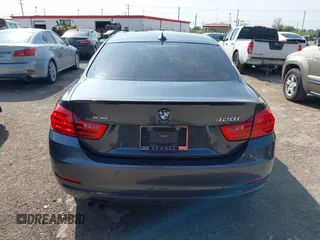 2015 BMW 4 Series 428i xDrive z VIN WBA3N5C55FK484938, wystawiony jako IAAI lot #41889907 z przebiegiem 100 439 mil mil oraz . Historia ofert i sprzedaży dostępna na DreamBid. Obrazek 16.