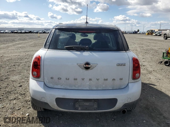 2015 MINI Countryman with VIN WMWZB3C50FWR44801, listed as a Copart auction lot 51957715 with 69,537 mi miles and Salvage Title. Bid and sale history available at DreamBid. Image 6.