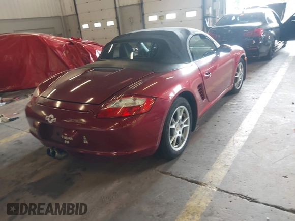 2006 Porsche Boxster z VIN WP0CA29806S710303, wystawiony jako IAAI lot #42276368 z przebiegiem 73 796 mil mil oraz . Historia ofert i sprzedaży dostępna na DreamBid. Obrazek 4.