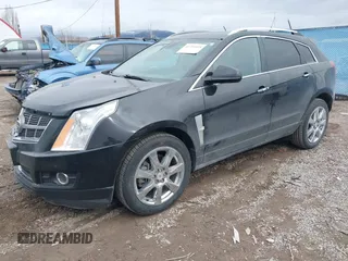 2012 Cadillac SRX Performance Collection with VIN 3GYFNBE38CS630415, listed as a IAAI auction lot 41753419 with 130,436 mi miles. Bid and sale history available at carsss.com. Image 2.
