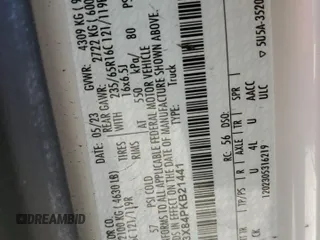 2023 Ford Transit Cargo z VIN 1FTBW3X84PKB21441, wystawiony jako Copart lot #54926995 z przebiegiem 56 038 mil mil oraz Szkoda całkowita • Salvage title. Historia ofert i sprzedaży dostępna na DreamBid. Obrazek 13.