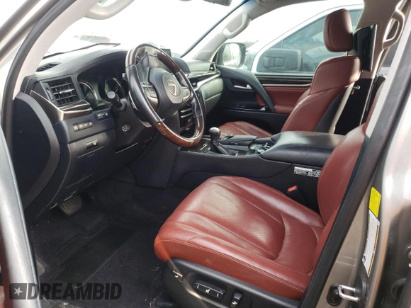 2017 Lexus LX 570 z VIN JTJHY7AX8H4239538, wystawiony jako Copart lot #69252602 z przebiegiem Nie podano mil oraz . Historia ofert i sprzedaży dostępna na DreamBid. Obrazek 7.