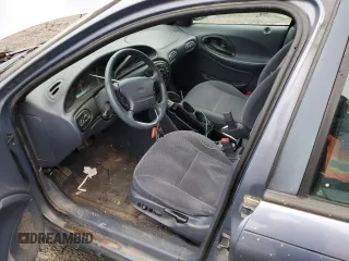 1999 Ford Taurus SE z VIN 1FAFP53U4XG150881, wystawiony jako Copart lot #40964564 z przebiegiem 124 928 mil mil oraz Tytuł czysty. Historia ofert i sprzedaży dostępna na DreamBid. Obrazek 7.