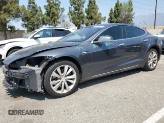 2014 Tesla Model S 60 с VIN 5YJSA1H11EFP64764, выставлен на аукционе Copart как лот 64265815 с пробегом 126 191 миль миль и Списание • Salvage title. История ставок и продаж доступна на DreamBid. Изображение 1.