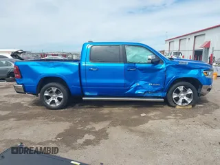 2021 Ram 1500 Laramie with VIN 1C6SRFJT1MN774879, listed as a IAAI auction lot 42242318 with 51,971 mi miles and . Bid and sale history available at DreamBid. Image 14.