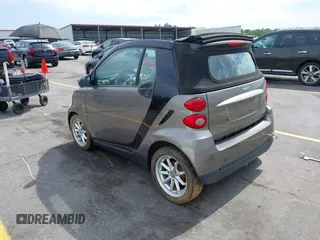 2009 Smart fortwo Passion with VIN WMEEK31XX9K299061, listed as a IAAI auction lot 42190127 with 96,156 mi miles. Bid and sale history available at carsss.com. Image 3.