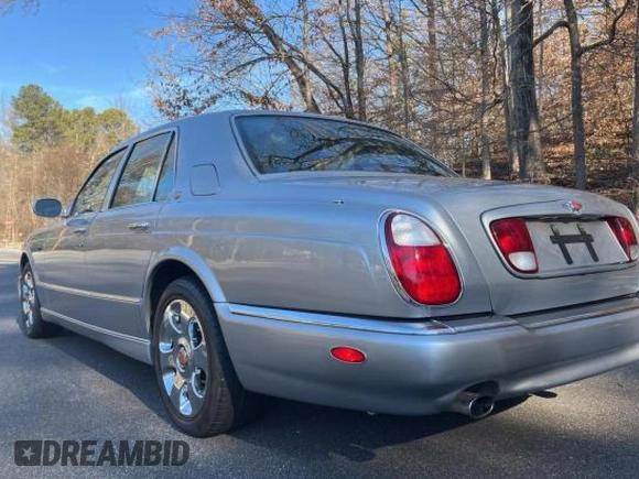 1999 Bentley Arnage with VIN SCBLB51E9XCX01954, listed as a Copart auction lot 46446125 with 81,913 mi miles and Clean Title. Bid and sale history available at DreamBid. Image 4.